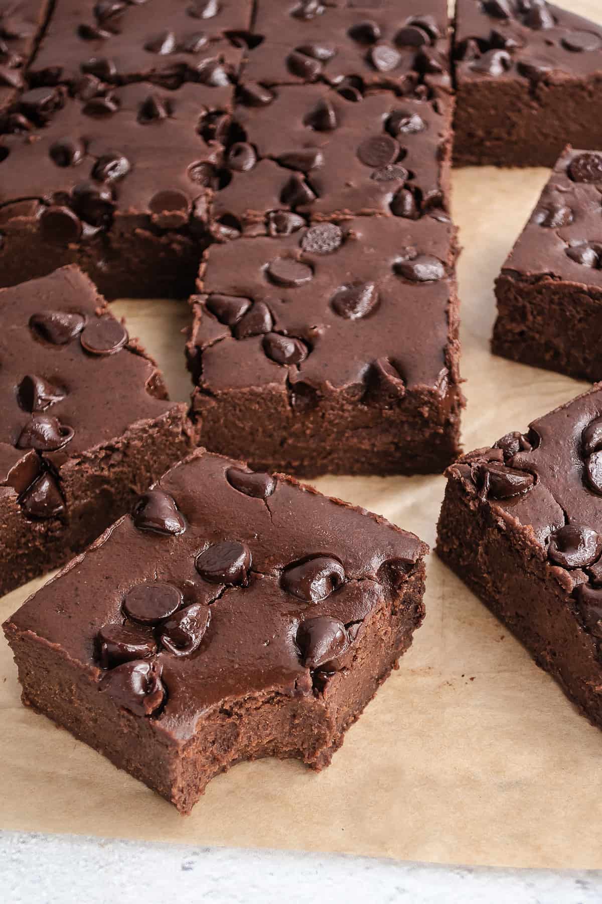 close up of brownies on parchment paper