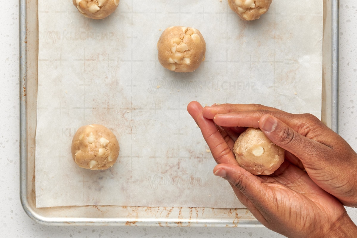 hand rolling cookie dough.
