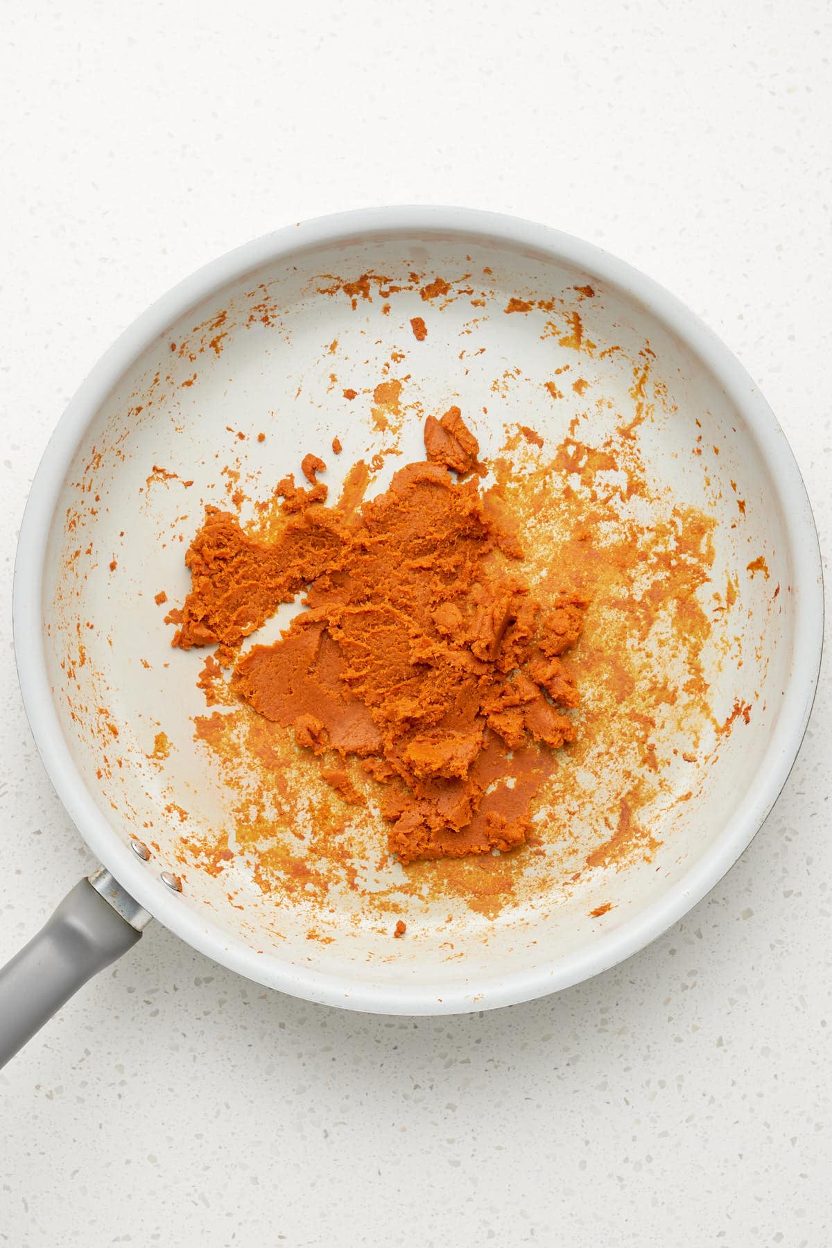 pumpkin puree dehydrated in a skillet.