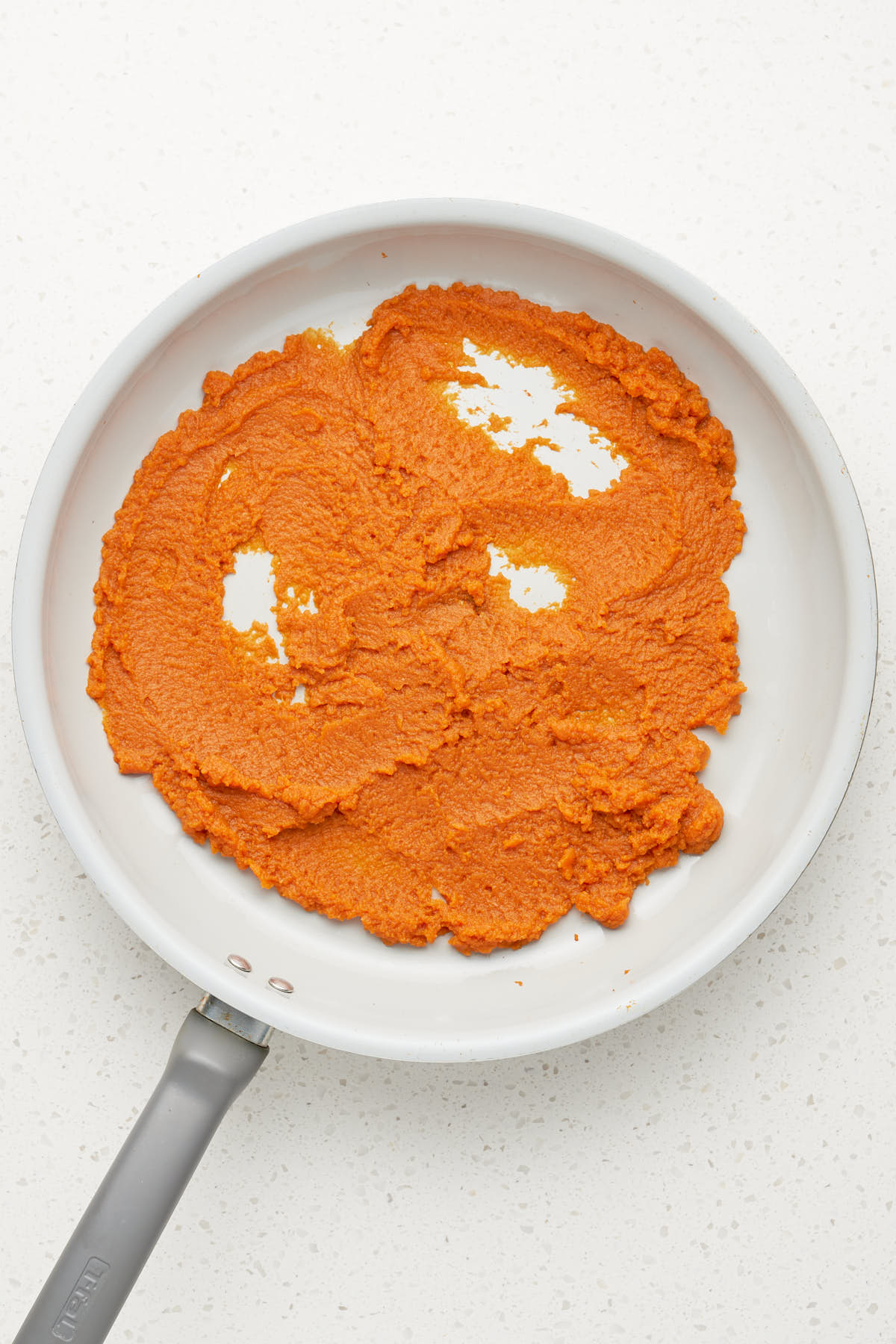 pumpkin puree in a skillet.